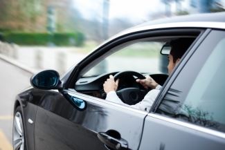 Man Driving a Car